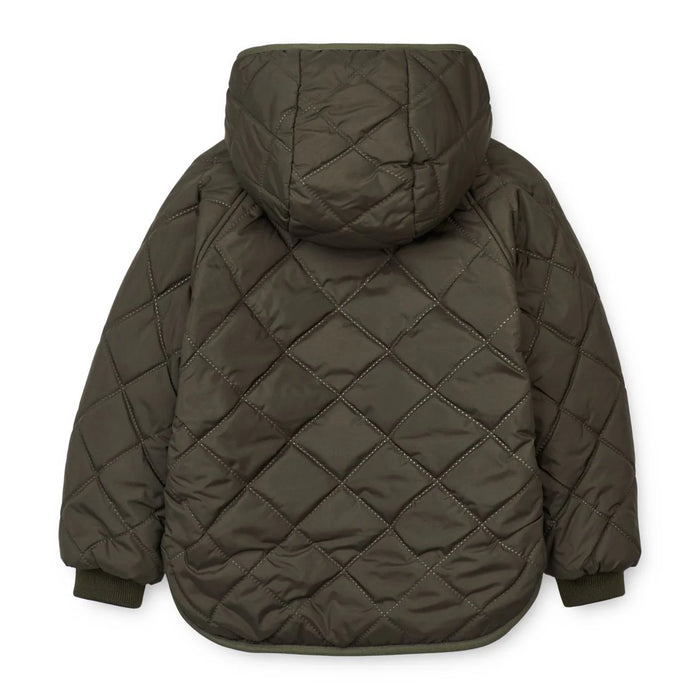 Close-up of Jackson jacket showcasing quilted padding, zipper closure, and elastic binding.