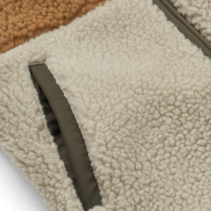 Close-up of Jackson jacket showcasing quilted pocket lining